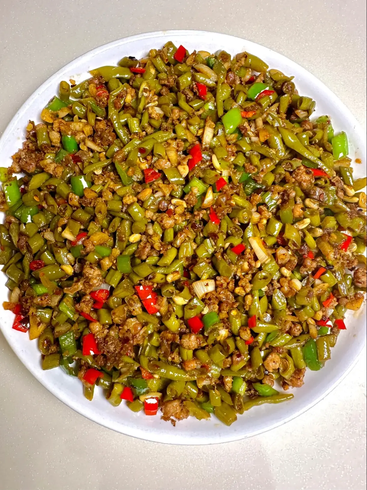 肉末酸豆角：一道不起眼的小炒，凭什么让人多吃两碗饭？